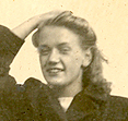 Alice Young as a young woman on a windy boat