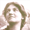 Close-up of Rilla as a young woman with mountains in the background
